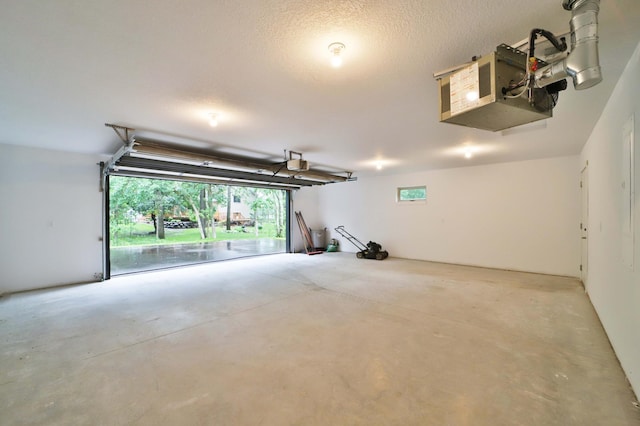 14729 Wildflower Dr, Baxter, MN 56425 - garage featuring a garage door opener and a heating unit