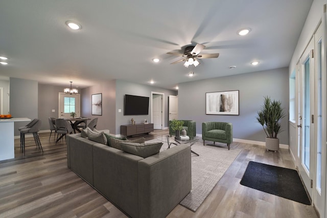 14729 Wildflower Dr, Baxter, MN 56425 - living area with wood finished floors, a chandelier, a ceiling fan, and recessed lighting