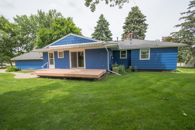 12423 93rd Ave N, Maple Grove, MN 55369 - rear view of house with a wooden deck and a lawn