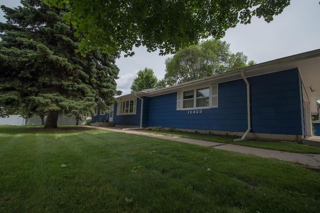 12423 93rd Ave N, Maple Grove, MN 55369 - ranch-style home featuring a front lawn