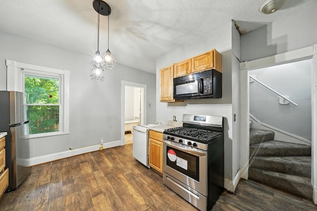 870 Clark St, Saint Paul, MN 55130 - kitchen featuring stainless steel appliances, dark wood-style floors, light countertops, hanging light fixtures, and a textured ceiling