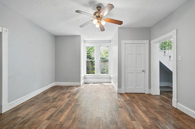 870 Clark St, Saint Paul, MN 55130 - empty room with wood finished floors, a textured ceiling, and a ceiling fan