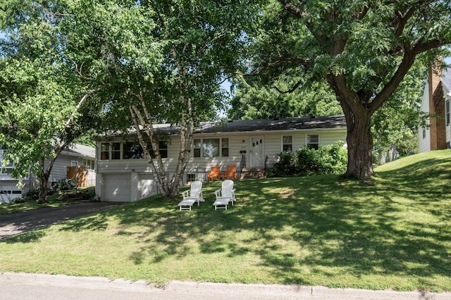 3420 Parkview Blvd, Robbinsdale, MN 55422 - view of front of house featuring an attached garage, driveway, and a front yard