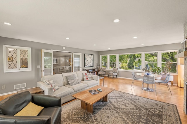 3420 Parkview Blvd, Robbinsdale, MN 55422 - living room with light wood-style flooring and recessed lighting