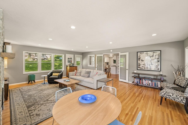 3420 Parkview Blvd, Robbinsdale, MN 55422 - living room with light wood finished floors and recessed lighting