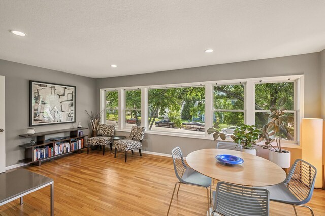 3420 Parkview Blvd, Robbinsdale, MN 55422 - dining area with light wood-style floors and recessed lighting