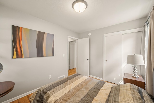 3420 Parkview Blvd, Robbinsdale, MN 55422 - bedroom with wood finished floors and a closet