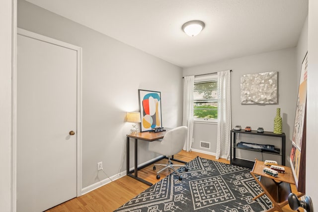 3420 Parkview Blvd, Robbinsdale, MN 55422 - office area with wood finished floors and baseboards