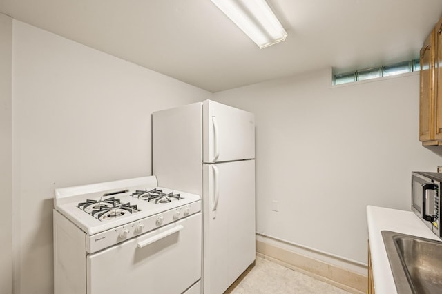 3420 Parkview Blvd, Robbinsdale, MN 55422 - kitchen featuring white appliances and a sink