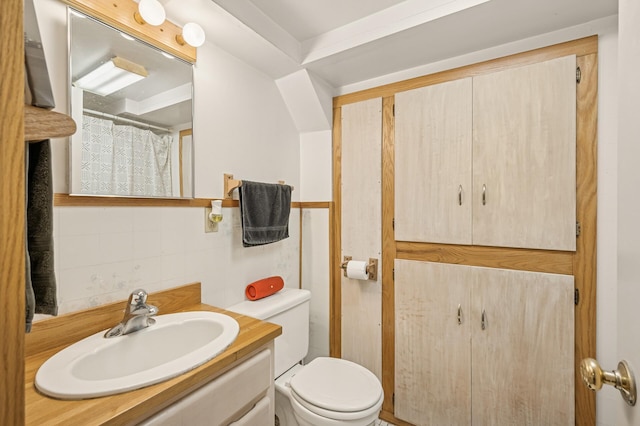 3420 Parkview Blvd, Robbinsdale, MN 55422 - bathroom featuring decorative backsplash, vanity, and tile walls
