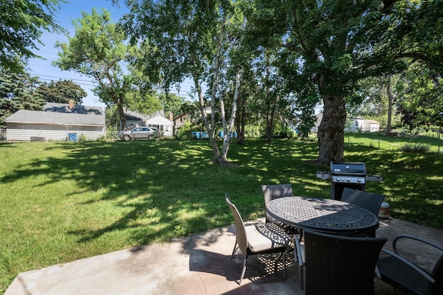 3420 Parkview Blvd, Robbinsdale, MN 55422 - view of yard featuring a patio and outdoor dining space