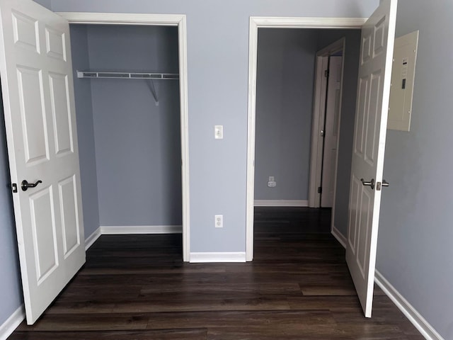 2012 11th Ave SE Unit B, Rochester, MN 55904 - unfurnished bedroom with dark wood-type flooring, a closet, and electric panel