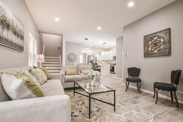 4220 Brookside Ave, Saint Louis Park, MN 55416 - living area with light wood-style flooring, stairs, and recessed lighting