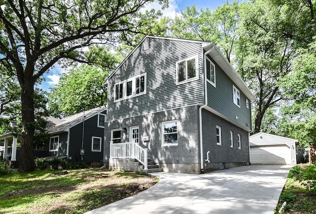 4220 Brookside Ave, Saint Louis Park, MN 55416 - view of front of home featuring an outbuilding and a garage