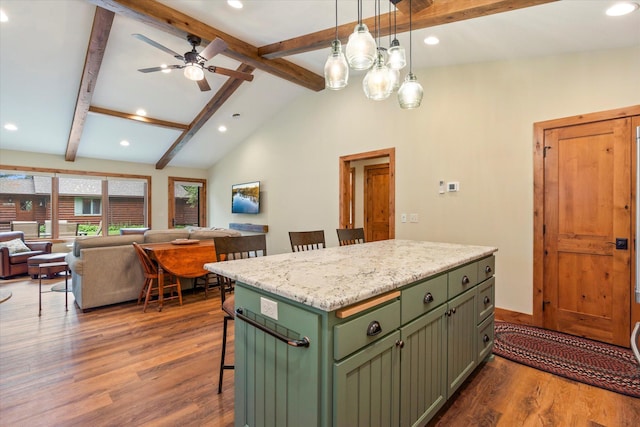 25761 Echo Bay Rd, Bay Lake Twp, MN 56444 - kitchen with green cabinets, wood finished floors, recessed lighting, open floor plan, and a breakfast bar area