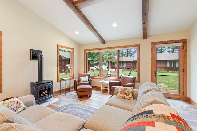 25761 Echo Bay Rd, Bay Lake Twp, MN 56444 - living area featuring a wood stove, light wood-style flooring, and recessed lighting