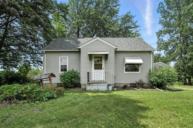 8775 County Road 10 E, Waconia, MN 55387 - bungalow-style house with a front lawn and roof with shingles