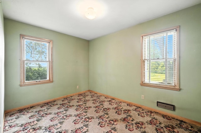 8775 County Road 10 E, Waconia, MN 55387 - empty room with healthy amount of natural light