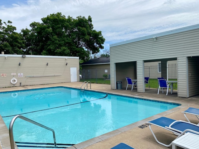 6333 Vera Cruz Ln N, Brooklyn Park, MN 55429 - community pool featuring a patio area