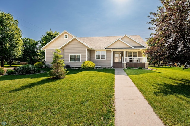 210 1st St, Arthur, ND 58006 - view of front of house featuring a porch and a front lawn