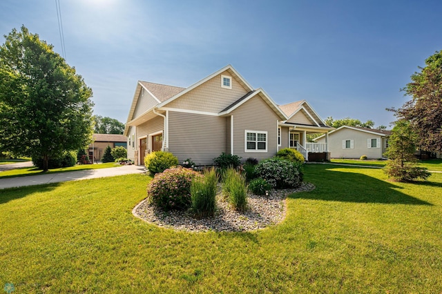 210 1st St, Arthur, ND 58006 - craftsman inspired home featuring a front lawn, concrete driveway, an attached garage, and a porch