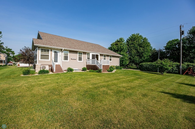 210 1st St, Arthur, ND 58006 - view of front of home with a front lawn and a shingled roof