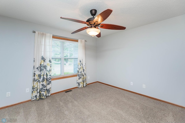 210 1st St, Arthur, ND 58006 - unfurnished room featuring carpet flooring and a ceiling fan