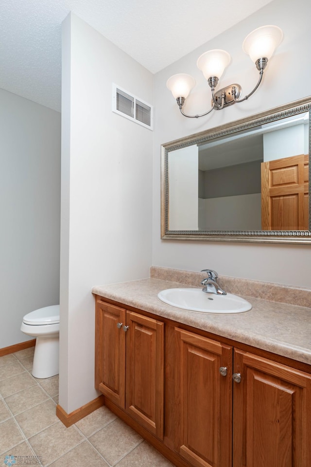 210 1st St, Arthur, ND 58006 - bathroom featuring vanity and tile patterned floors