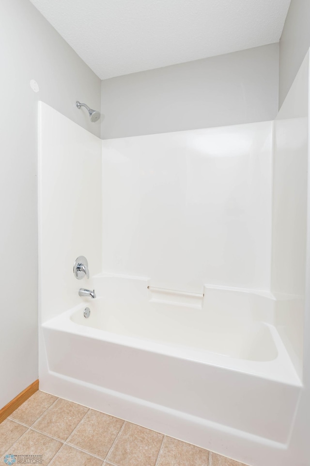 210 1st St, Arthur, ND 58006 - full bath featuring shower / bath combination and tile patterned flooring