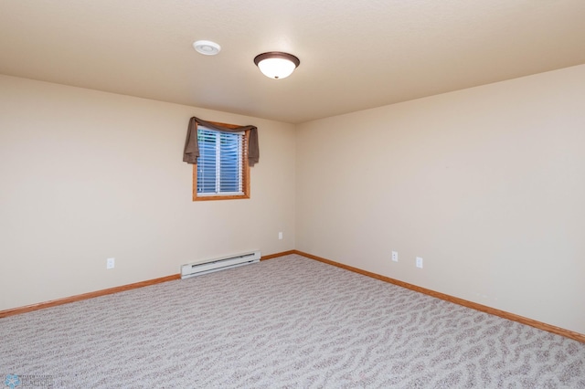 210 1st St, Arthur, ND 58006 - spare room with a baseboard heating unit and carpet flooring