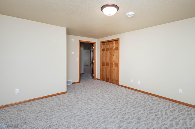 210 1st St, Arthur, ND 58006 - carpeted spare room featuring baseboards and a smoke detector