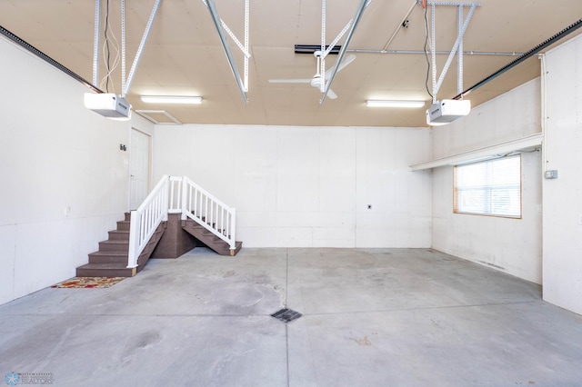 210 1st St, Arthur, ND 58006 - garage featuring a garage door opener