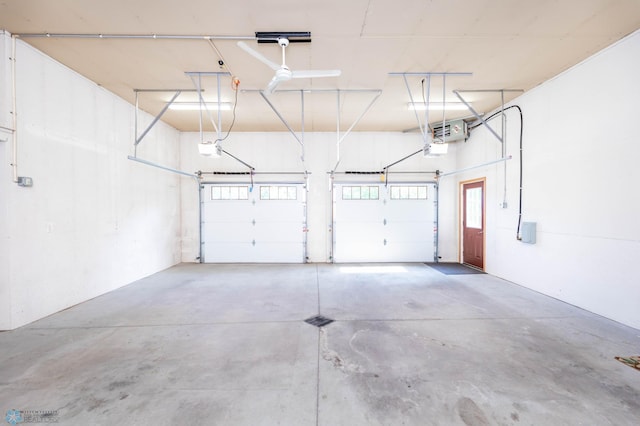 210 1st St, Arthur, ND 58006 - garage featuring a garage door opener
