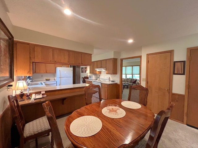 1804 7th St SW, Willmar, MN 56201 - dining area with carpet floors, an office area, and recessed lighting