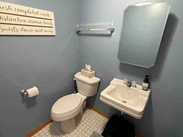 912 3rd St NE, Roseau, MN 56751 - half bath with baseboards and toilet