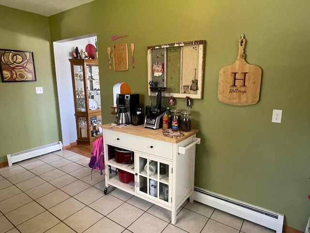912 3rd St NE, Roseau, MN 56751 - bar with baseboard heating and light tile patterned floors
