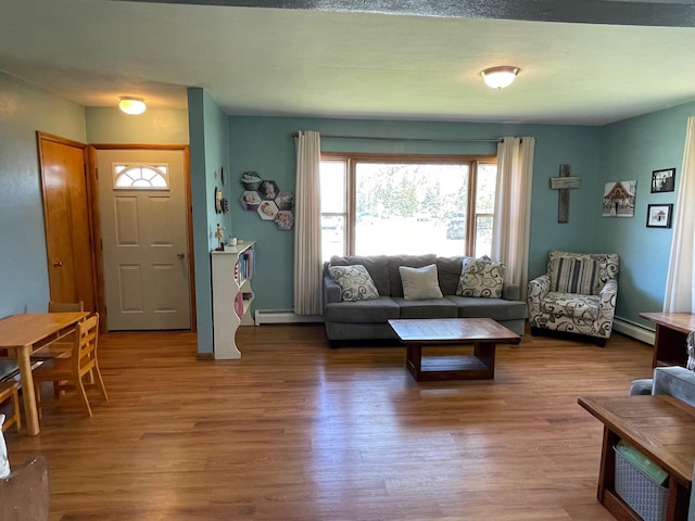 912 3rd St NE, Roseau, MN 56751 - living area with wood finished floors and baseboard heating
