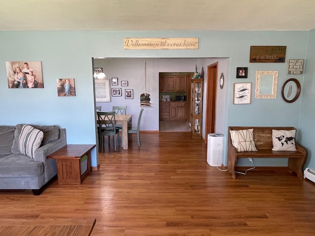 912 3rd St NE, Roseau, MN 56751 - living room featuring light wood-style flooring and baseboards