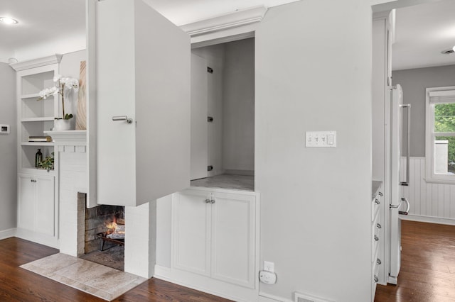 6045 Oakland Ave, Minneapolis, MN 55417 - corridor with dark wood finished floors and wainscoting