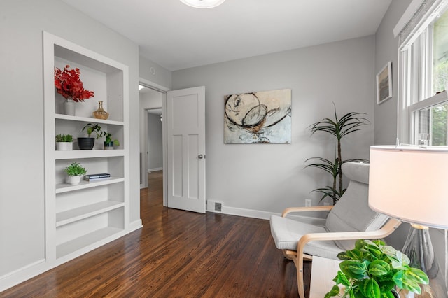 6045 Oakland Ave, Minneapolis, MN 55417 - living area with dark wood-style floors and built in features