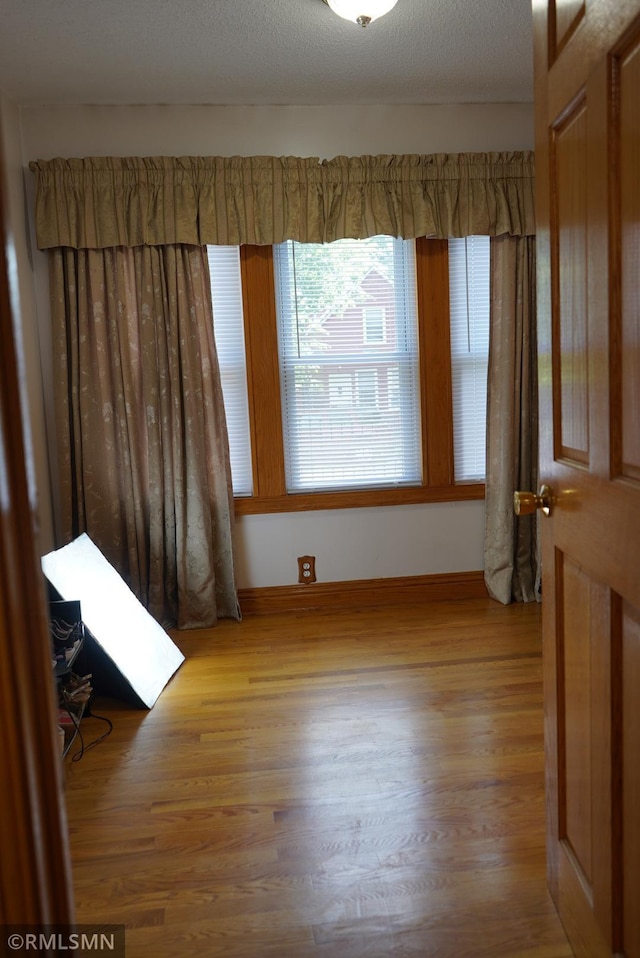 653 Thomas Ave, Saint Paul, MN 55104 - unfurnished room featuring wood finished floors