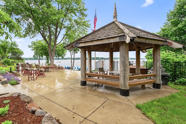 4371 Wilshire Blvd Unit 107, Mound, MN 55364 - view of property's community with a gazebo, a water view, and a patio