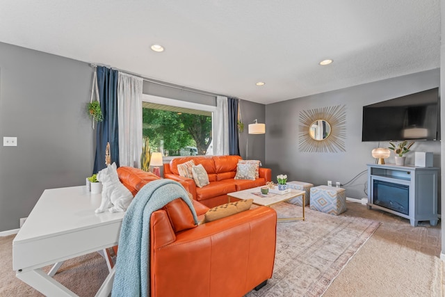 1622 3rd St NE, Rochester, MN 55906 - carpeted living room with a fireplace and recessed lighting