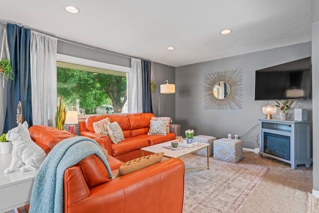1622 3rd St NE, Rochester, MN 55906 - living room with carpet, a glass covered fireplace, and recessed lighting