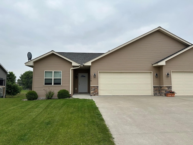 1778 Sequoia Ln, New Richmond, WI 54017 - ranch-style house with an attached garage, a front yard, concrete driveway, and stone siding