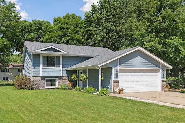 704 Lexington Ave N, New Prague, MN 56071 - tri-level home with brick siding, an attached garage, a front lawn, driveway, and roof with shingles