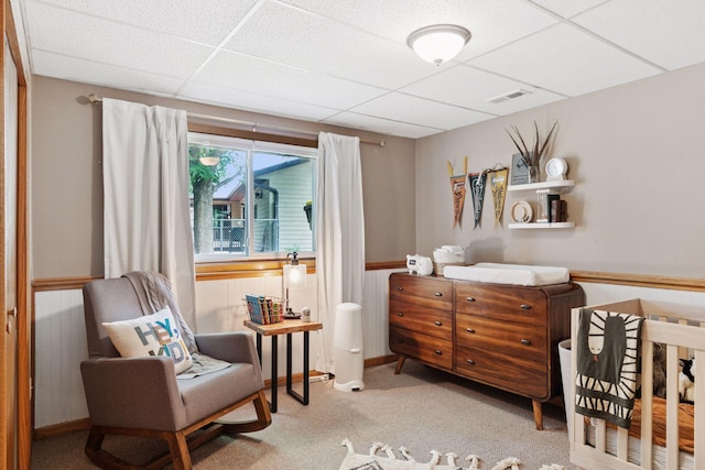 704 Lexington Ave N, New Prague, MN 56071 - sitting room with a drop ceiling, wainscoting, and carpet floors