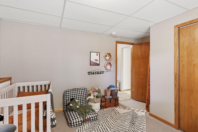 704 Lexington Ave N, New Prague, MN 56071 - carpeted bedroom with a drop ceiling and baseboards
