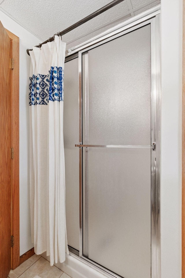 704 Lexington Ave N, New Prague, MN 56071 - bathroom with a stall shower and tile patterned flooring