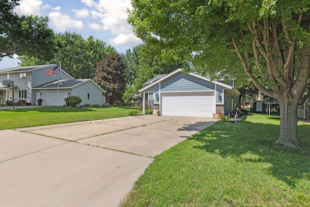 704 Lexington Ave N, New Prague, MN 56071 - view of front of home featuring a front yard, driveway, an attached garage, and brick siding